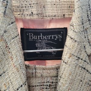 Classic Women’s Burberry skirt suit.